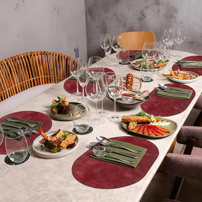 ADRIMER Placemats, Heat Resistant Oval Placemats Set of 12 Washable 12 x 17 Inch, Waterproof Table Mats, Wipeable Pu Place Mats for Kitchen, Dining Room, Wine Red