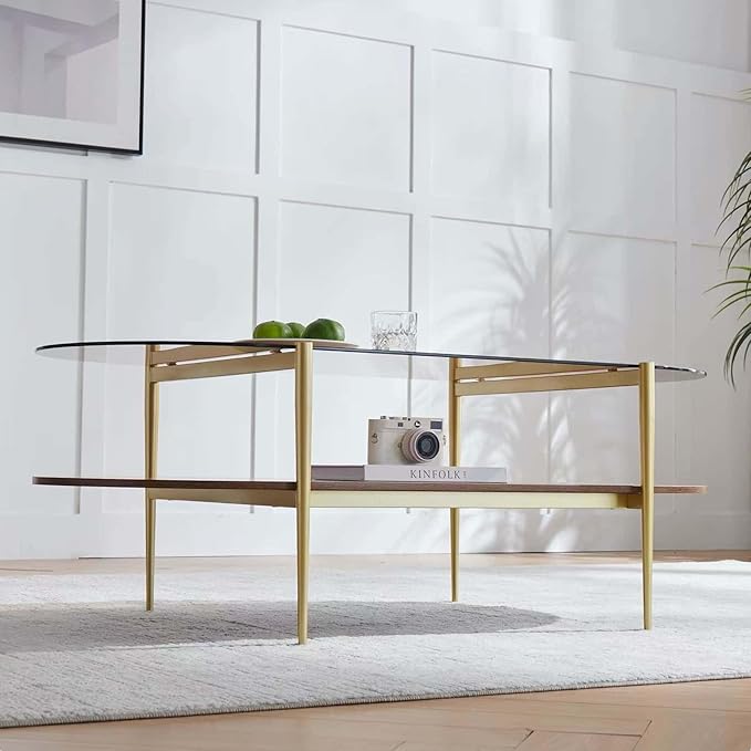 X-Large Oval Glass Coffee Table, Mid-Century Modern Design, L47 x W24 x H17 inch, for Living Room, Clear Glass Top and Walnut Finish Wood Shelf, Conical Legs with Gold Finish Frame