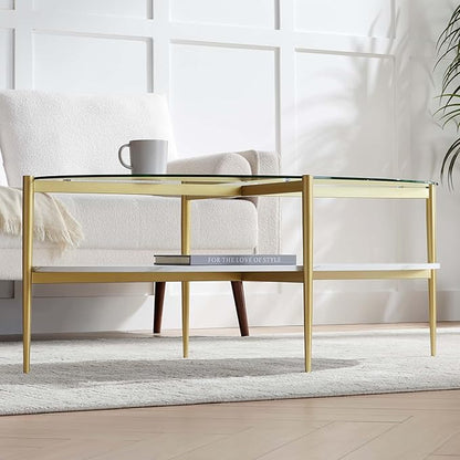 Oval Glass Coffee Table, Mid-Century Modern Design, L43 x W22 x H17 inch, Surfboard Shaped Clear Glass Top and White Marble Finish Wood Shelf, Tapered Legs with Gold Finish Frame