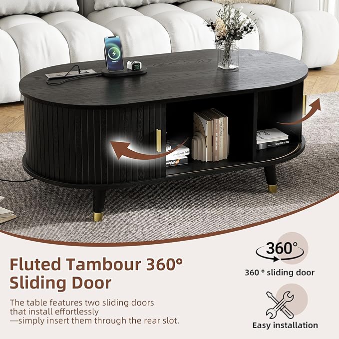 Mid-Century Fluted Oval Coffee Table with 360° Tambour Doors, Hidden Storage, Solid Wood Legs & 2 AC+2 USB Charging Station, Modern Coffee Table for Living Room, Apartment, Black