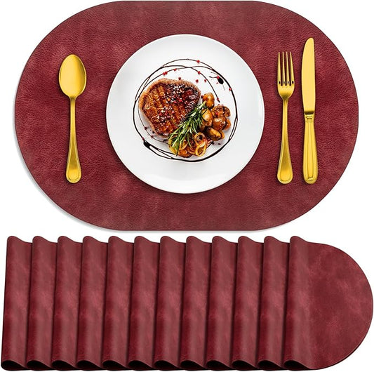 ADRIMER Placemats, Heat Resistant Oval Placemats Set of 12 Washable 12 x 17 Inch, Waterproof Table Mats, Wipeable Pu Place Mats for Kitchen, Dining Room, Wine Red