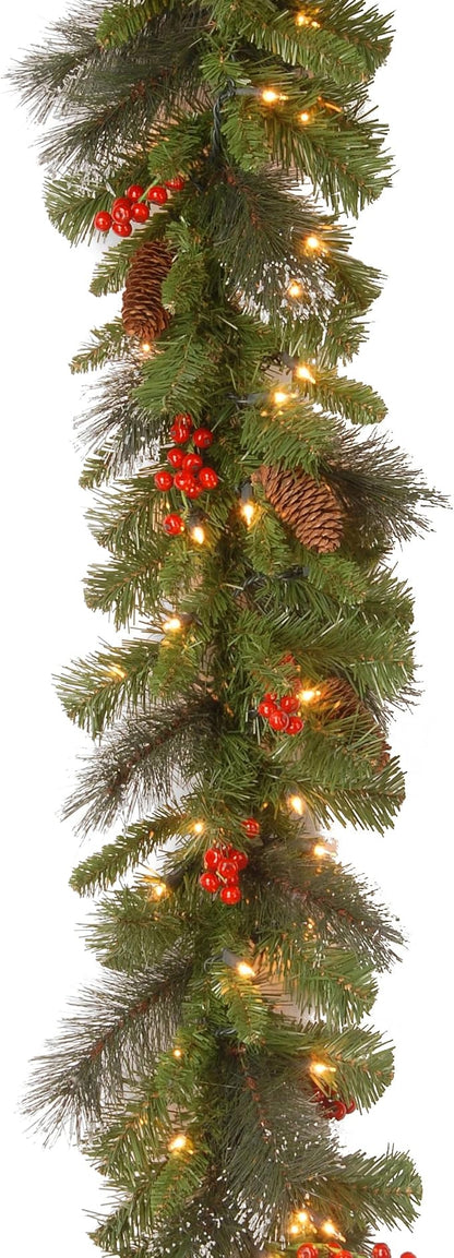 National Tree Company 9 ft Pre-Lit Crestwood Spruce Artificial Christmas Garland, Christmas Decoration with Glitter, Pinecones, Red Berries, 50 Clear Lights, 180 Tips, Green