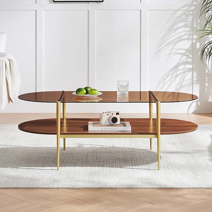 X-Large Oval Glass Coffee Table, Mid-Century Modern Design, L47 x W24 x H17 inch, for Living Room, Amber Glass Top and Walnut Finish Wood Shelf, Conical Legs with Gold Finish Frame