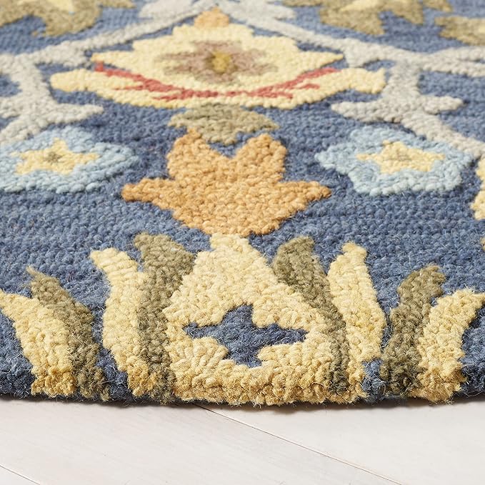 SAFAVIEH Blossom Collection Accent Rug - 4'6" x 6'6" Oval, Navy & Multi, Handmade Wool, Ideal for The Living Room, Bedroom, Dining Room (BLM402A-5OV)