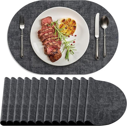 Placemats Set of 12 Washable, Heat Resistant Table Placemats Wipeable Faux Leather Oval Place Mats Non Slip, Waterproof Oval Table Mats for Indoor Outdoor, Charcoal