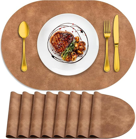 ADRIMER Placemats, Heat Resistant Oval Placemats Set of 8 Washable 12 x 17 Inch, Waterproof Table Mats, Wipeable Pu Place Mats for Kitchen, Dining Room, Sandy Light Brown