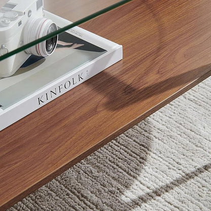 X-Large Oval Glass Coffee Table, Mid-Century Modern Design, L47 x W24 x H17 inch, for Living Room, Clear Glass Top and Walnut Finish Wood Shelf, Conical Legs with Gold Finish Frame